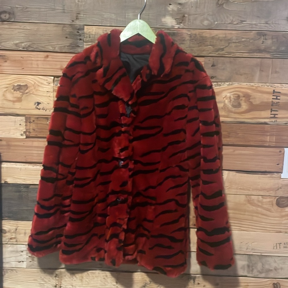 Size women’s medium, red & black reversible zebra print jacket